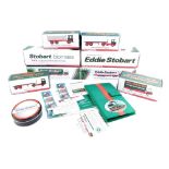 A group of Eddie Stobart models, flat bed truck, Stobart manual, certificates of authenticity, Scani