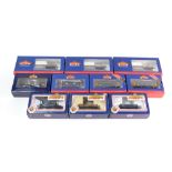 Bachmann OO gauge rolling stock, including 38-346 RNA Nuclear Flask wagons, 37-050 five plank wagon,