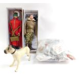 An Action Man Red Devil figure, together with an Action Man Commando, hound, further clothing and ac