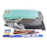 A group of car accessories, to include a set of Mazda floor mats, a Jaguar conversion gasket and hea