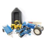 Ertl and Tonka die cast farm vehicles and machinery, comprising a Ford 4000 tractor, bail loader and