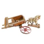 A Victorian painted pine pull-a-long horse, dappled grey, on a wheeled base, two wheels lacking, 25c