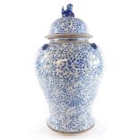A Chinese blue and white porcelain baluster jar and cover, the cover with dog of fo finial, decorate