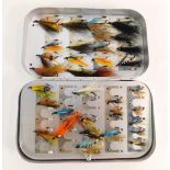 A Wheatley Silmalloy fly case, containing a selection of salmon flies.