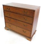 A George III oak chest, of four long graduated drawers, raised on bracket feet, cut down, 88cm high,