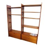 A Staples Ladderax teak two section modular shelving unit, with a drinks cabinet and bureau, 200cm