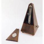 A French Maelzel Paquet beech cased metronome, 22cm high.