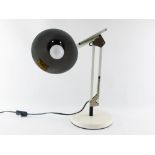 A German Contrast white anglepoise type table lamp, with two extensions, on circular base, approxima