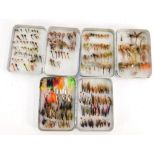 Three Richard Wheatley small alloy fly boxes, and a collection of wet flies, nymphs and dry flies,