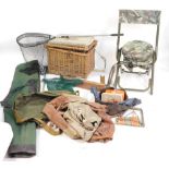 A group of fishing tackle, seats, canvas bags, landing nets, fly box, etc.