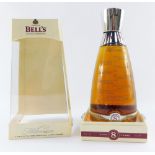 A Bell's Extra Special Fine Single Malt Millennium Edition for 2000, aged 8 years, n collector's cas