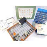 An assortment of fishing flies, to include retailers counter top display case with an assortment