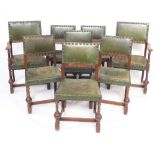 A set of eight Carolean revival oak dining chairs, with studded green leather backs and