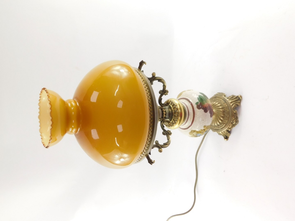 A 20thC oil lamp style electric table lamp, with orange glass shade on a brass three prong support, - Image 3 of 4