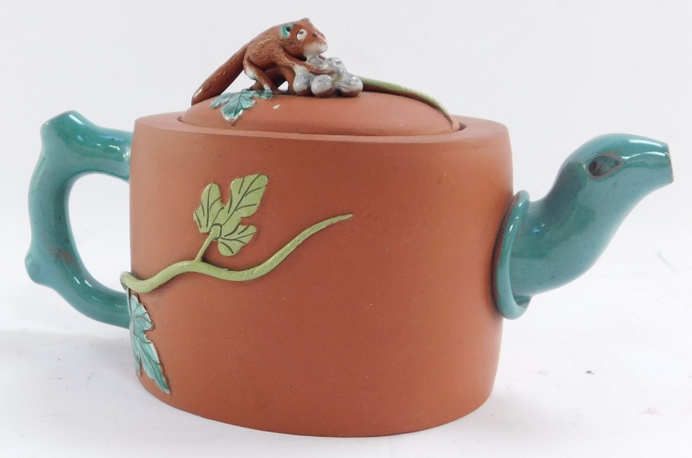 A Chinese redware teapot, with animal finial, carrying berries on vines and a bat, with turquoise ha - Image 2 of 4