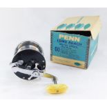 A Penn Long Beach 60 multiplier sea reel, with original box and wrapping.