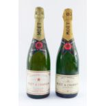Two Moet & Chandon Champagnes, comprising Premier Cuvee, 75cl bottle, and Brut Imperial, 75cl bottle