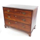 A late Georgian mahogany chest of three long drawers, raised on bracket feet, 85cm high, 108.5cm