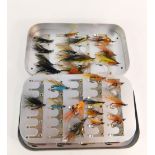 A Wheatley Silmalloy fly case, containing a selection of salmon flies.