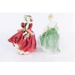 Two Royal Doulton figures, comprising Fair Lady HN2193, and Top O' The Hill HN1834, 19cm high.