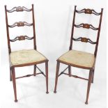 A pair of Victorian beech and inlaid ladder back bedroom chairs.