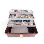 A plastic cantilever fishing tackle box, and tackle to include a collection of Devon Minnows, Toby