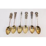 Six Chinese silver spoons, each with bamboo effect shaft and differing terminals, to include buildin