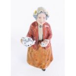 A Royal Doulton porcelain figure modelled as Tea Time, HN2255, 19cm high.