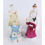 Three Royal Doulton porcelain figures, comprising Ann HN2739, 20cm high, Vanity HN2475, 14cm high,