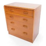 A G-Plan 1950's teak chest, of four long drawers, raised on a plinth base, 84cm high, 76cm wide,