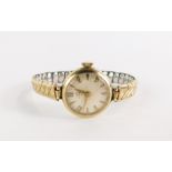 A 9ct gold Uno lady's wristwatch, the 9ct gold circular watch head with 17 jewel movement, 1.5cm dia