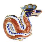 A Royal Crown Derby dragon paperweight, gold stopper, 11.5cm high, boxed.