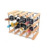 A wine rack and eight bottles of wine, comprising Moet Class, Cabernet Sauvignon 2005, Georges Dubce