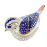 A Royal Crown Derby Imari paperweight of a bird, with silvered stopper, No L111, 6cm high, boxed.