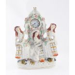 A Staffordshire late 19thC flat back figural pocket watch holder, depicting three maidens, holding a