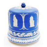 A Wedgwood blue jasperware cheese dome and cover, with an acorn shaped finial, the body decorated wi