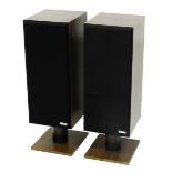 A pair of Bowers and Wilkins free standing speakers, in simulated rosewood cases, 88cm high.