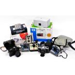 A quantity of camera equipment, to include Fuji Finepix, Zenith TTL camera with lens, etc.