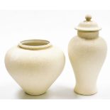 Two French studio pottery vases, each on a white ceramic ground, with applied mottled detailing, com