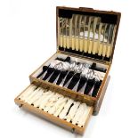 A Viners canteen of chromoid cutlery, contained in an oak case, the case 35c wide.