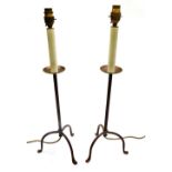 A pair of cast iron pricket style electric table lamps, 58cm high.