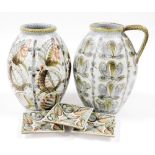 A group of Denby Glynn Colledge design stoneware, with stylised floral decoration, comprising flagon