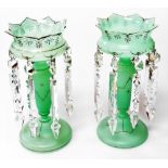 A pair of late 19th green frosted glass table lustres, with clear glass prismatic drops, 28cm high.