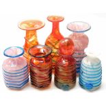 A collection of 20thC Mdina glassware, to include an orange and blue glass bottle and stopper, with