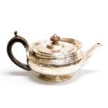 A Victorian silver teapot, of plain form with an ebonised knop and handle, stamped no 7012, Hunt & R