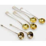 A set of four Victorian Old English pattern silver mustard spoons, with silver gilt bowls, initialle