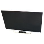 A Sony Bravia 42" flat screen television, with lead and remote.