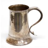 A George II silver tankard, of plain form, with a scroll handle and a heart shaped terminal, Sutton