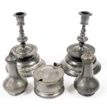 A pair of mid 17thC style pewter candlesticks, each with circular sconce above a knop stem on a circ