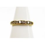 An 18ct gold and diamond half hoop eternity ring, set with ten round brilliant cut diamonds, approx